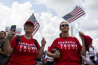 <p>Demonstrators wave national flags and placards during the pro-Trump ‘Mother of All Rallies’ on the National Mall in Washington, DC on Sept. 16, 2017. (Photo: Zach Gibson/AFP/Getty Images) </p>