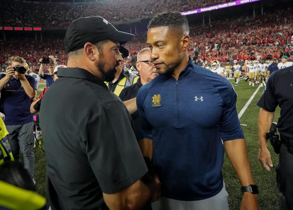 Sep 3, 2022; Columbus, Ohio, USA;  Ohio State Buckeyes head coach Ryan Day shakes hands with Notre Dame Fighting Irish head coach Marcus Freeman following the NCAA football game at Ohio Stadium. Ohio State won 21-10. Mandatory Credit: Adam Cairns-USA TODAY Sports