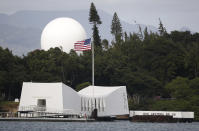 FILE - USS Arizona Memorial, part of the World War II Valor in the Pacific National Monument, is seen at Joint Base Pearl Harbor-Hickam, Hawaii on Dec. 27, 2016. Hiroshima and Pearl Harbor, two symbols of World War II animosity between Japan and the United States, are now promoting peace and friendship through a sister park arrangement. U.S. Ambassador to Japan Rahm Emanuel and Hiroshima Mayor Kazumi Matsui signed a sister park agreement on Thursday, June 29, 2023, for Hiroshima’s Peace Memorial Park and the Pearl Harbor National Memorial of Hawaii. (AP Photo/Carolyn Kaster, File)