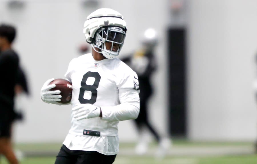 Las Vegas Raiders running back Josh Jacobs runs a drill during practice at the Raiders Headquarters/Intermountain Health Performance Center, Wednesday, Aug. 30, 2023, in Henderson, Nev. (Steve Marcus/Las Vegas Sun via AP)