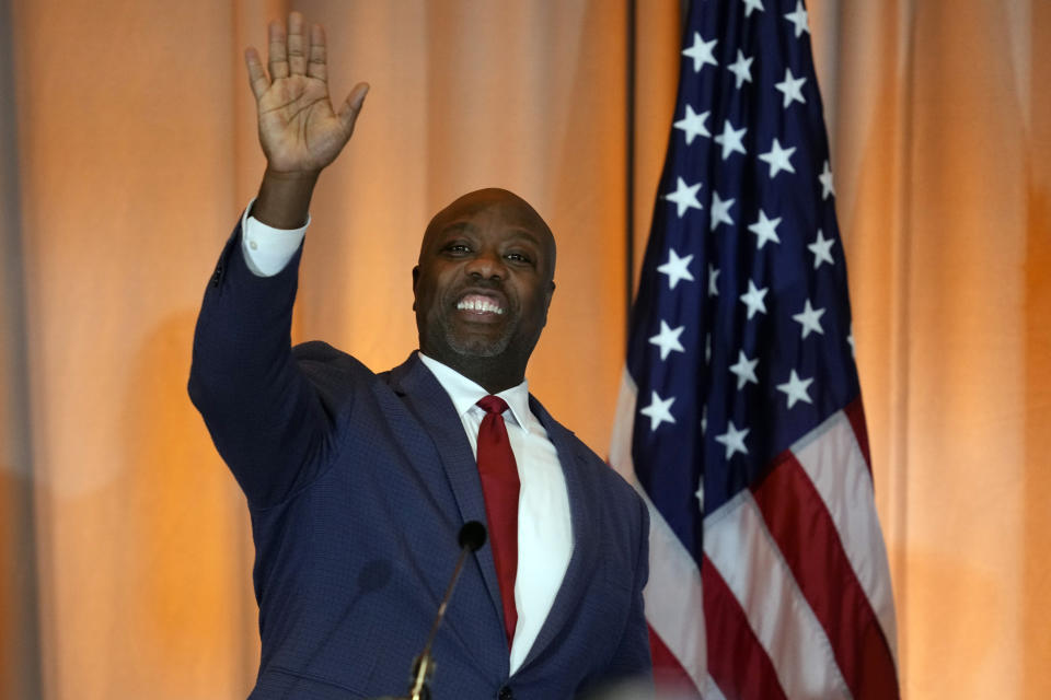 Sen. Tim Scott, R-S.C., waves as he walks to the stage to speak at the California Republican Party Convention Friday, Sept. 29, 2023, in Anaheim, Calif. (AP Photo/Ashley Landis)