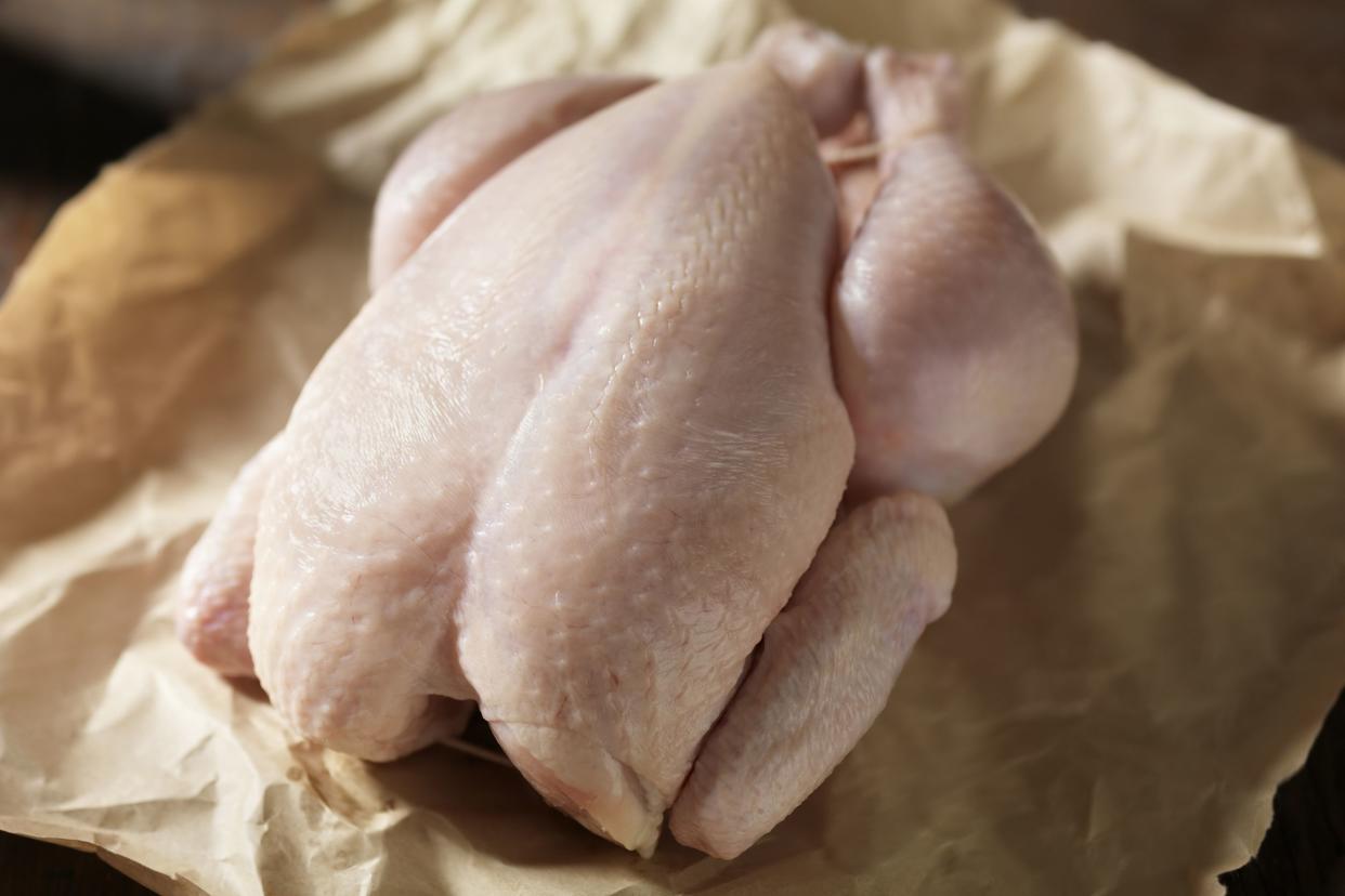 raw chicken in butchers paper