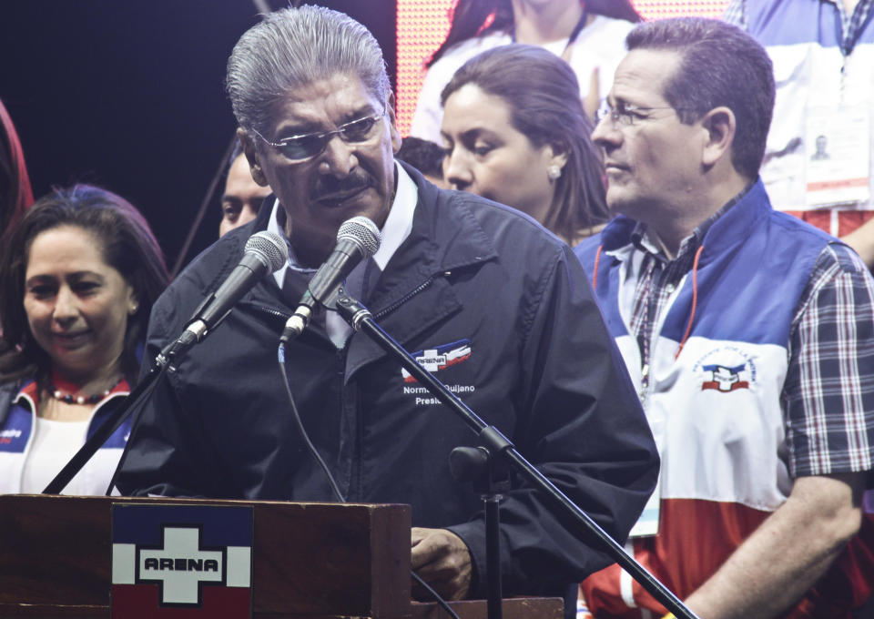 San Salvador Mayor Norman Quijano, presidential candidate of the Nationalist Republican Alliance party, ARENA talks to supporters over presdential election results in San Salvador, El Salvador, Sunday, Feb. 2, 2014. El Salvador's electoral tribunal said late Sunday that with about 58 per cent of the votes counted, Vice-President Salvador Sanchez had 49 per cent in his bid to extend the rule of the Farabundo Marti National Liberation Front, the party of former civil war guerrillas that won the presidency for the first time in 2009. Sanchez was just under the 50 per cent plus one vote he needed to win outright, but election tribunal chief Eugenio Chicas predicted the candidate would fall short and have to face a runoff. San Salvador Mayor Norman Quijano was second with nearly 39 per cent as the candidate of the long-governing conservative Nationalist Republican Alliance, known as ARENA. (AP Photo/Salvador Melendez)