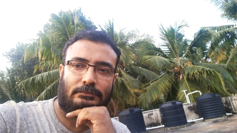 A close-up of Ratheesh Sukumaran in his terrace at home