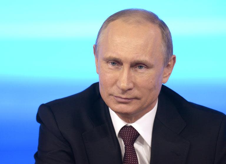 Russian President Vladimir Putin gives his annual televised question-and-answer session with the nation in Moscow, on April 17, 2014