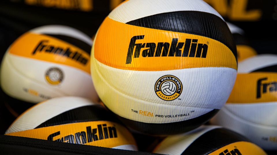 A basket of Franklin volleyballs with Pro Volleyball Federation branding. The professional volleyball league starts in January of 2024.