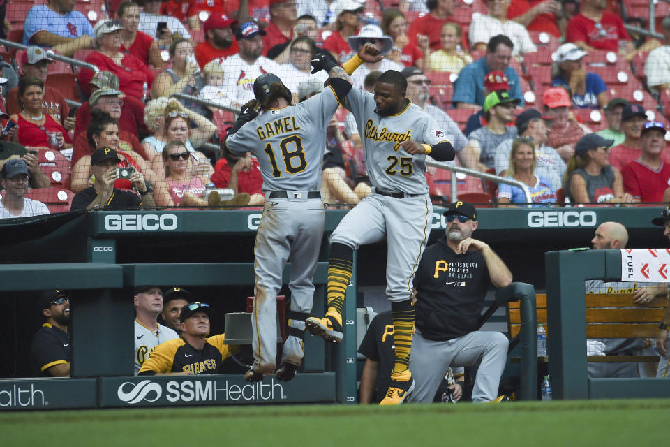 Pittsburgh Pirates' Ben Gamel, left, is congratulated by teammate Gregory Polanco after hitting a home run during the fifth inning of a baseball game against the St. Louis Cardinals, Sunday, June 27, 2021, in St. Louis. (AP Photo/Joe Puetz)