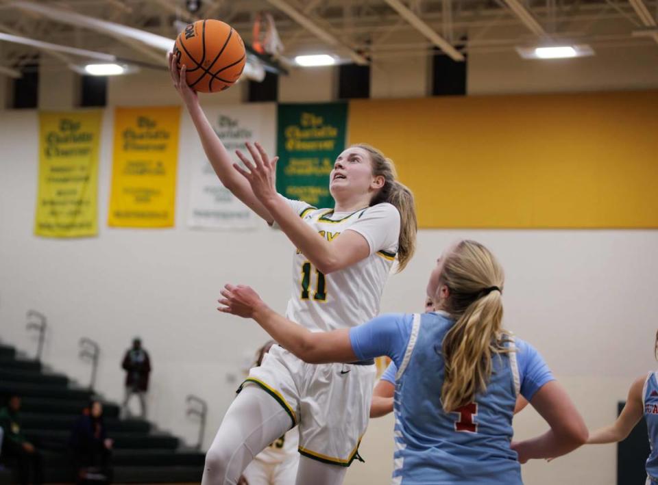 Patriot's Kamryn Kitchen (11) drives down the lane for a layup. Independence, the top-ranked girls basketball team, is scheduled to host the No. 2-ranked Charlotte Catholic Cougars on Dec. 12, 2023.