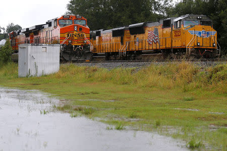 Train engines stand still on tracks in Orange, Texas, U.S., on August 30, 2017. REUTERS/Jonathan Bachman