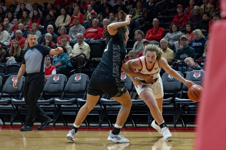 Marist's Jackie Piddock drives toward the baseline against Army during a Nov. 9, 2023 women's basketball game.