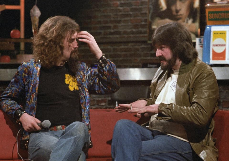 <p>Billy Connolly, left, interviewing John Bonham in 1979, the year before Bonham’s death</p>Rex