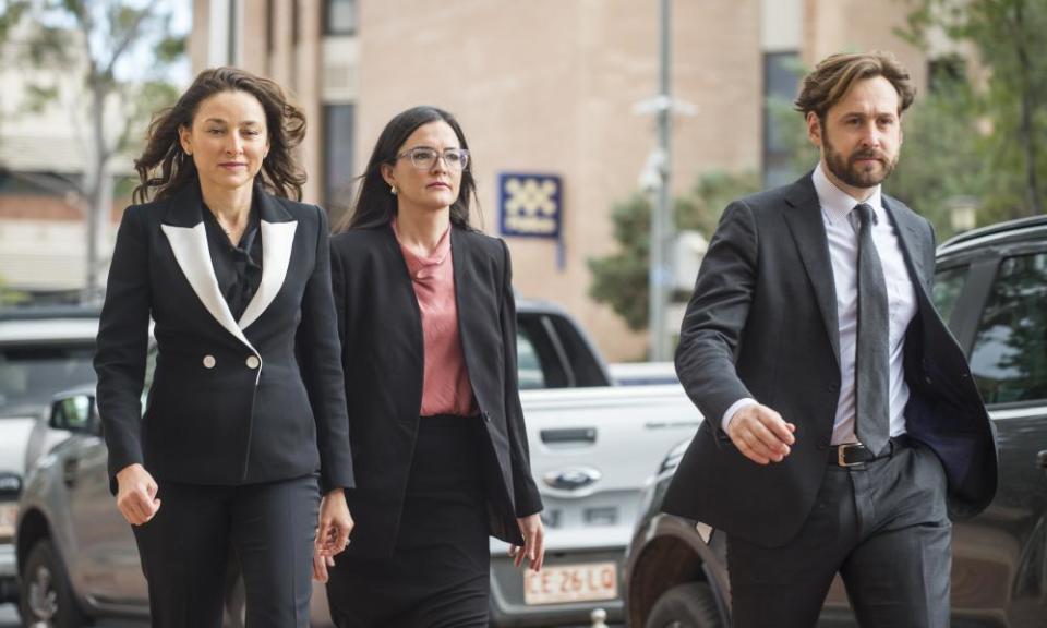 Counsels assisting the coroner Peggy Dwyer, Patrick Coleridge and solicitor Maria Walz (centre) arrive for the inquest into the death of Kumanjayi Walker