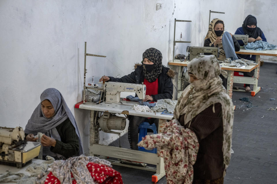 Afghan women work in a sewing workshop in Kabul, Afghanistan, Monday, March 6, 2023. After the Taliban came to power in Afghanistan, women have been deprived of many of their basic rights. (AP Photo/Ebrahim Noroozi)