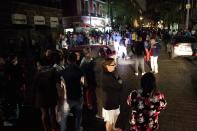 <p>People gather on a street in downtown Mexico City during an earthquake on September 7, 2017.<br> An earthquake of magnitude 8.0 struck southern Mexico late Thursday and was felt as far away as Mexico City, the US Geological Survey said, issuing a tsunami warning. It hit offshore 120 kilometers (75 miles) southwest of the town of Tres Picos in the state of Chiapas. (Pedro Pardo/AFP/Getty Images) </p>