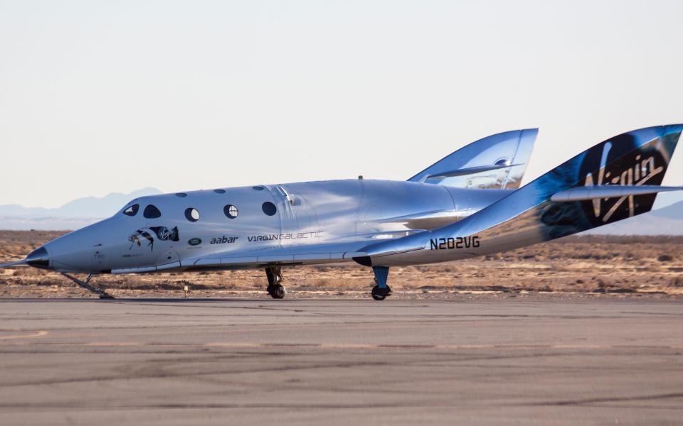 Virgin Galactic's SpaceShipTwo, dubbed the VSS Unity, lands after completing its first ever free-flight test over Mojave, California in December 2016