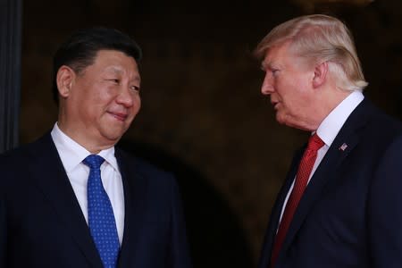 U.S. President Donald Trump welcomes Chinese President Xi Jinping at Mar-a-Lago state in Palm Beach, Florida, U.S.