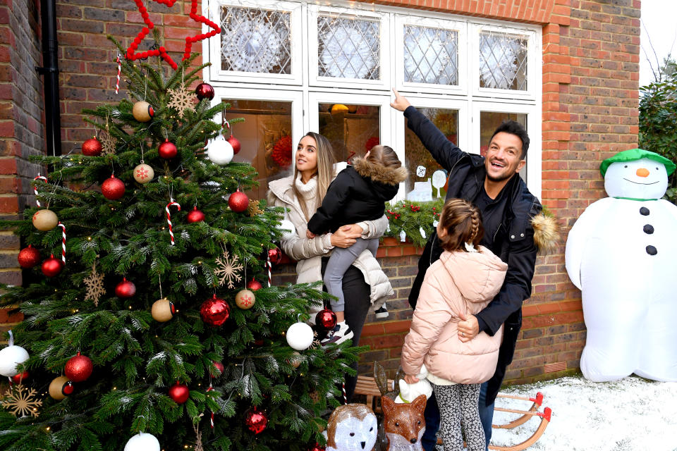 Peter Andre and Emily MacDonagh decorate their Christmas tree and windows as part of the The Snowman Winter Windows Campaign on December 06, 2020 in London, United Kingdom. (Photo by Dave J Hogan/Getty Images)