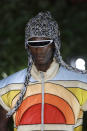 A model wears a creation as part of the Palm Angels men's Spring-Summer 2020 collection, unveiled during the fashion week, in Milan, Italy, Sunday, June 16, 2019. (AP Photo/Luca Bruno)