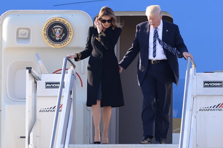 Did first lady Melania Trump brush off President Trump's hand again as they stepped off <em>Air Force One</em> in Rome?