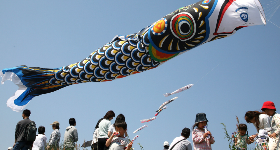 A giant carp streamer flies above the Tone River during the Citizen's Peace Festival on 3 May 2007 in Saitama, Japan. The giant carp, 100 metres in length, is the world's longest carp streamer. Carp streamers are traditionally displayed for the Boy's Festival (Tango no Sekku) celebrated in Japan on 5 May.