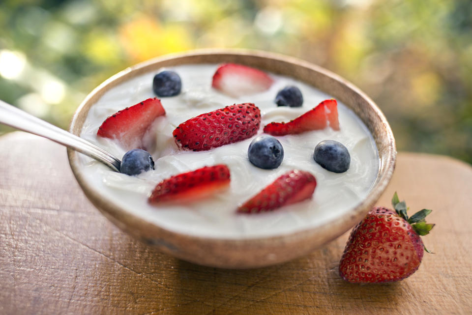 Greek yoghurt and fruit is packed with protein, carbs, and fiber that keeps you full and energised, without spiking blood sugar. Photo: Getty Images