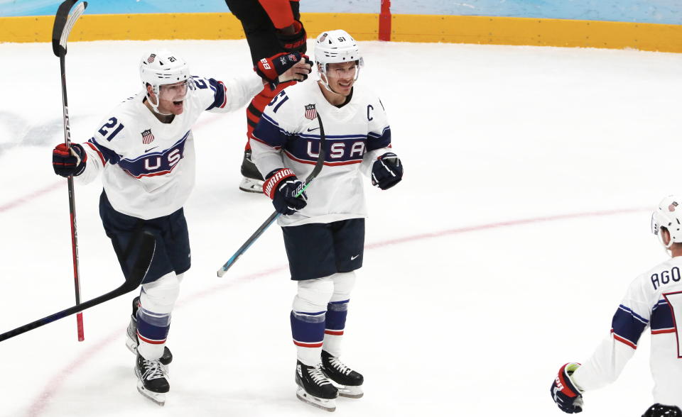 BEIJING, CHINA - FEBRUARY 12: Captain Andy Miele #51 of Team United States celebrate his goal with teammatte during the Men's Ice Hockey Preliminary Round Group A match between Team Canada and Team United States on Day 8 of the Beijing 2022 Winter Olympic Games at National Indoor Stadium on February 12, 2022 in Beijing, China. (Photo by Xavier Laine/Getty images)