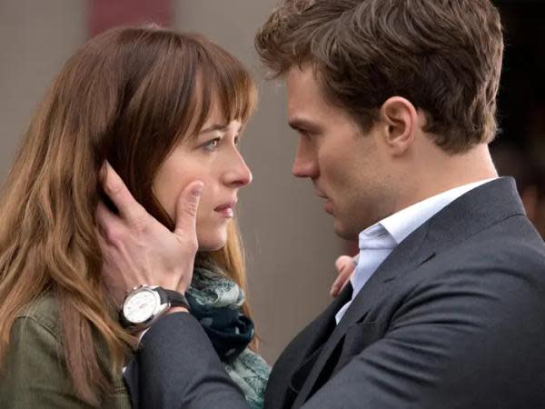 Jamie Dornan y Dakota Johnson en 50 Sombras de Grey (Crédito: Universal Pictures)