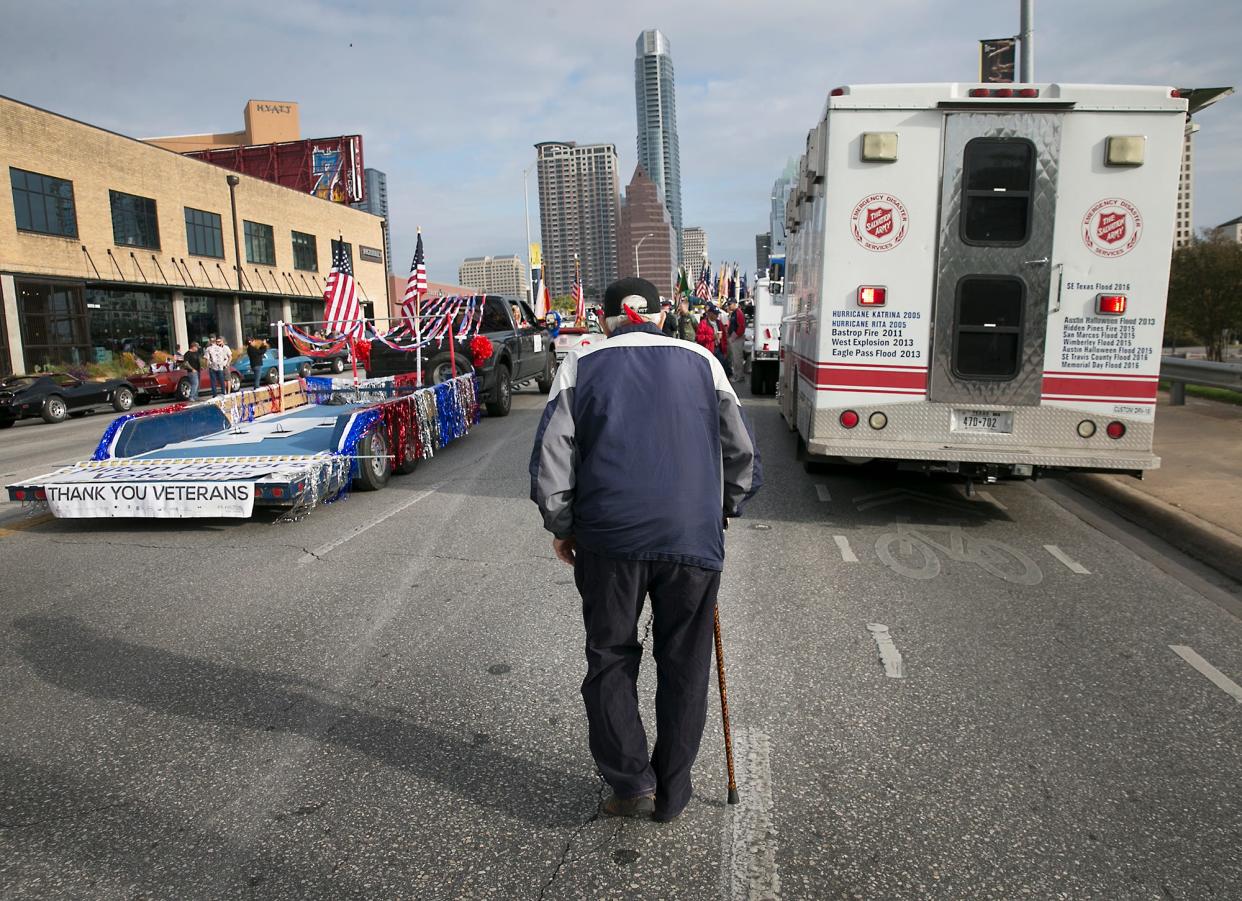 A veteran makes his way to the annual Veterans Day Parade route on the Ann Richards Congress Avenue bridge in Austin, in this 2017 file photo.