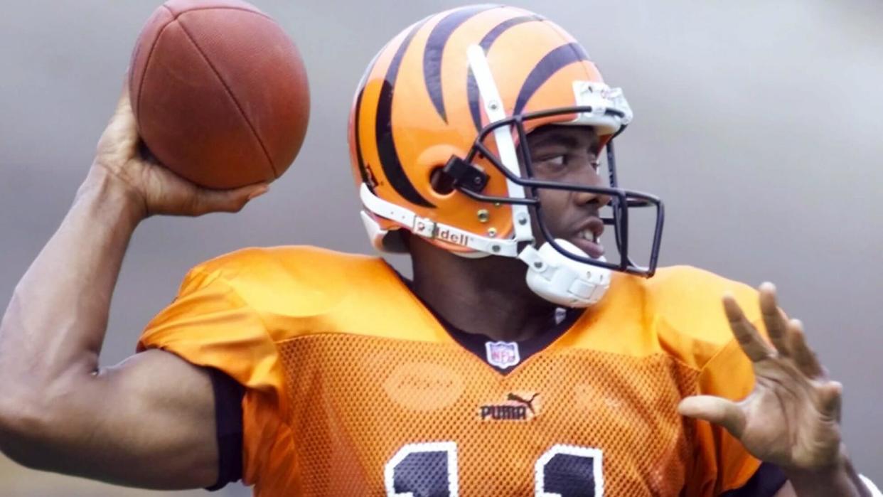 Mandatory Credit: Photo by Al Behrman/AP/Shutterstock (6478693a)SMITH Cincinnati Bengals quarterback Akili Smith throws a pass during practice in this photo from, in Cincinnati.