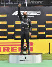 Mercedes driver Lewis Hamilton of Britain celebrates on the podium after winning the Styrian Formula One Grand Prix at the Red Bull Ring racetrack in Spielberg, Austria, Sunday, July 12, 2020. (Joe Klamar/Pool via AP)