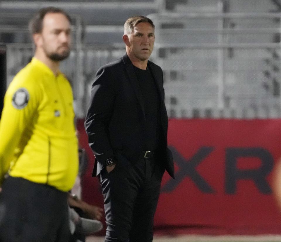 Apr 6, 2022; Chandler, Arizona, United States;  Phoenix Rising head coach Rick Schantz watches his team play against Valley United FC during the first half at Wild Horse Pass.