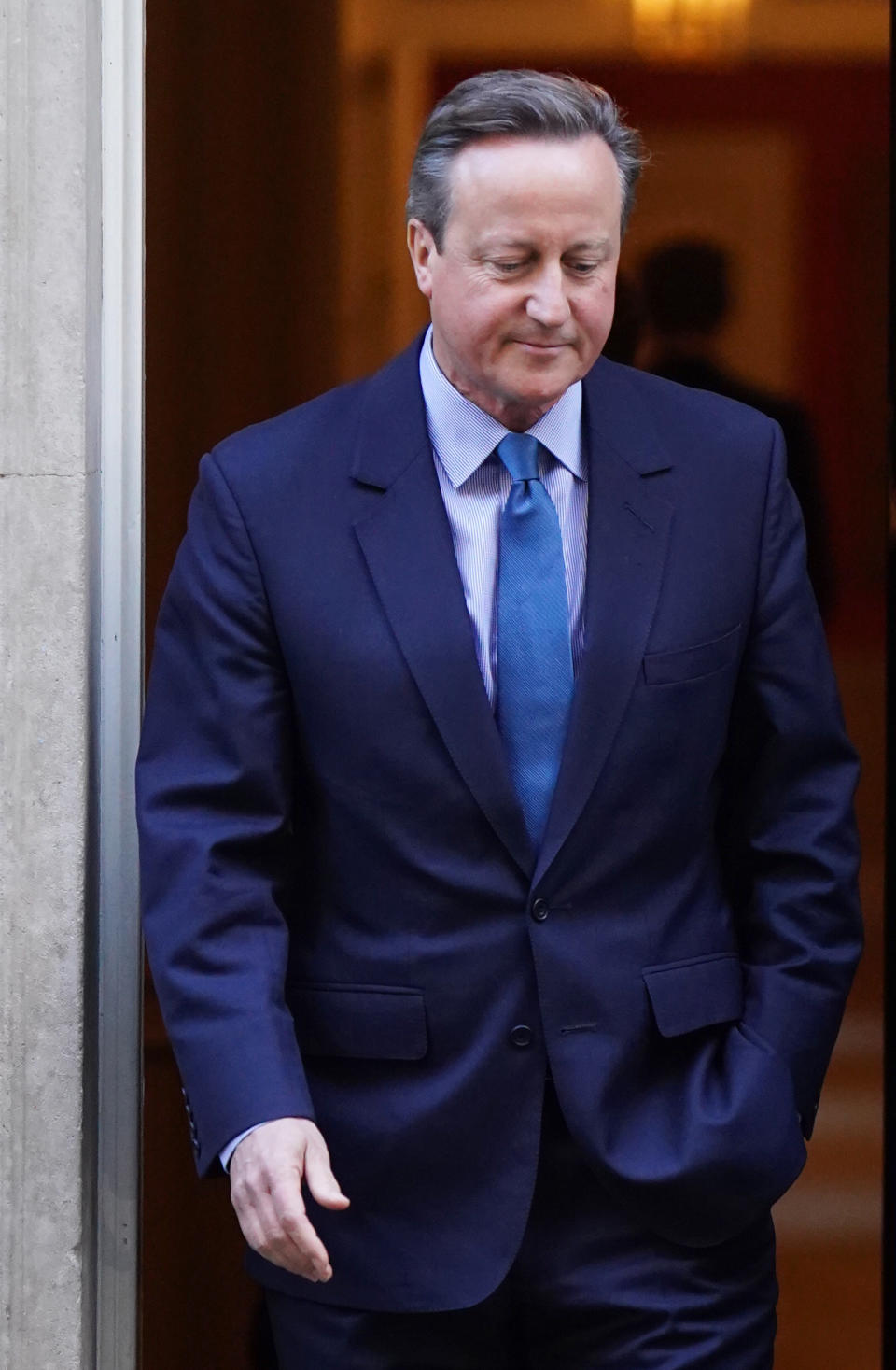 David Cameron leaves Downing Street after being appointed foreign secretary. (PA)