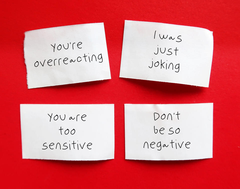 PostIt notes with YOU'RE OVER REACTING, I WAS JUST JOKING, YOU'RE SO SENSITIVE, DON'T BE SO NEGATIVE handwriting