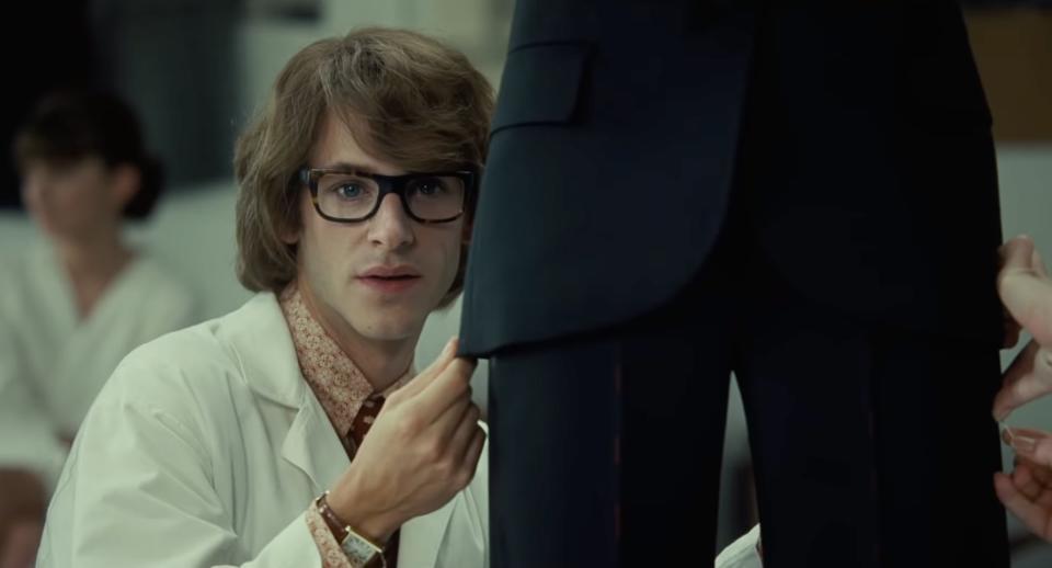 Gaspard Ulliel measuring a jacket in Saint Laurent