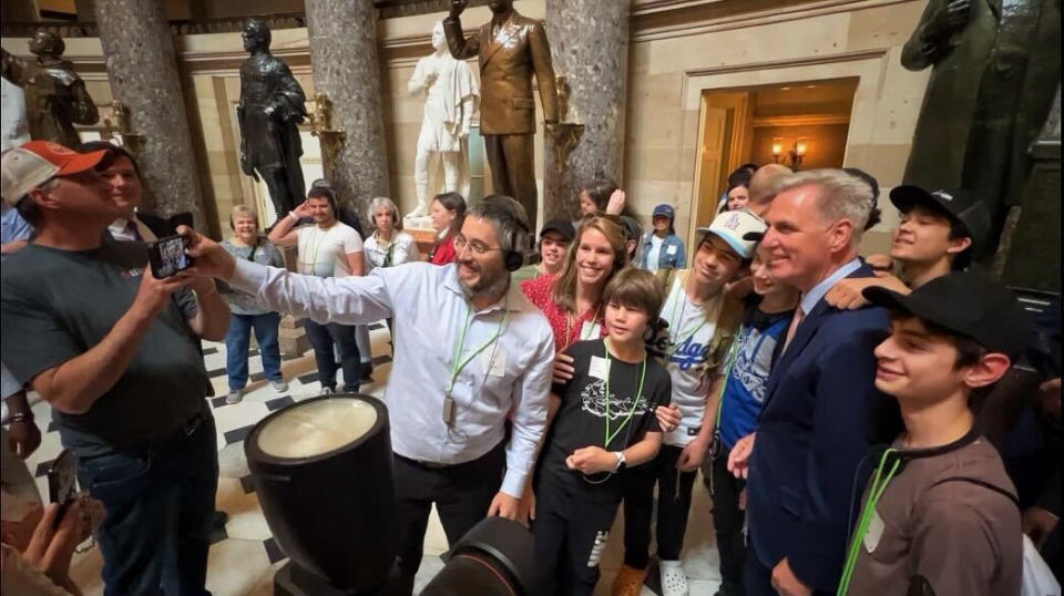 McCarthy poses with another group of tourists Thursday in the Capitol. (Frank Thorp V / NBC News)