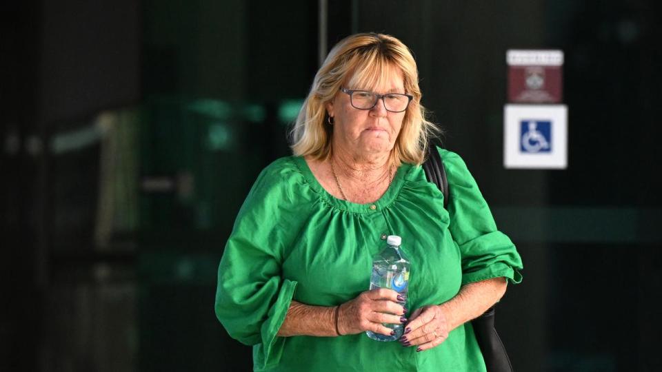 Sandra Cowan leaves the inquest