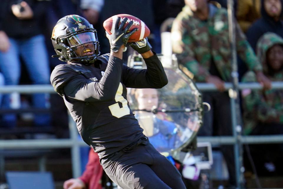 Purdue wide receiver David Bell (3) makes a catch for a touchdown against Michigan State during the first half of an NCAA college football game in West Lafayette, Ind., Saturday, Nov. 6, 2021.