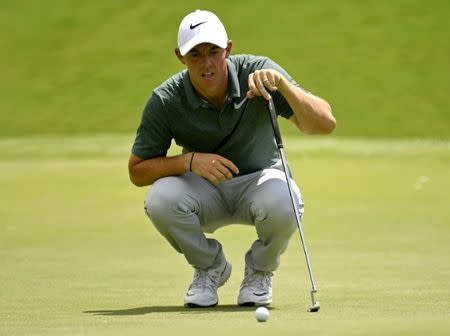 FILE PHOTO - Aug 12, 2017; Charlotte, NC, USA; Rory McIlroy lines up on the first hole during the third round of the 2017 PGA Championship at Quail Hollow Club. Mandatory Credit: Michael Madrid-USA TODAY Sports