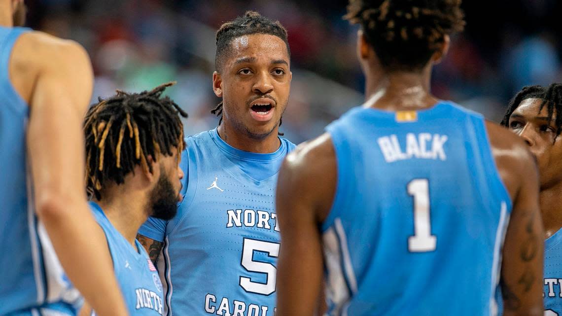 North Carolina’s Armando Bacot (5) talks with his teammates during a time out in the first half during the third round of the ACC Tournament on Thursday, March 9, 2023 at the Greensboro Coliseum in Greensboro, N.C.