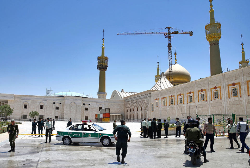 <p>Police officers control the scene, around the shrine of late Iranian revolutionary founder Ayatollah Khomeini, after an assault by several attackers in Tehran, just outside Tehran, Iran, Wednesday, June 7, 2017. (Photo: Ebrahim Noroozi/AP) </p>