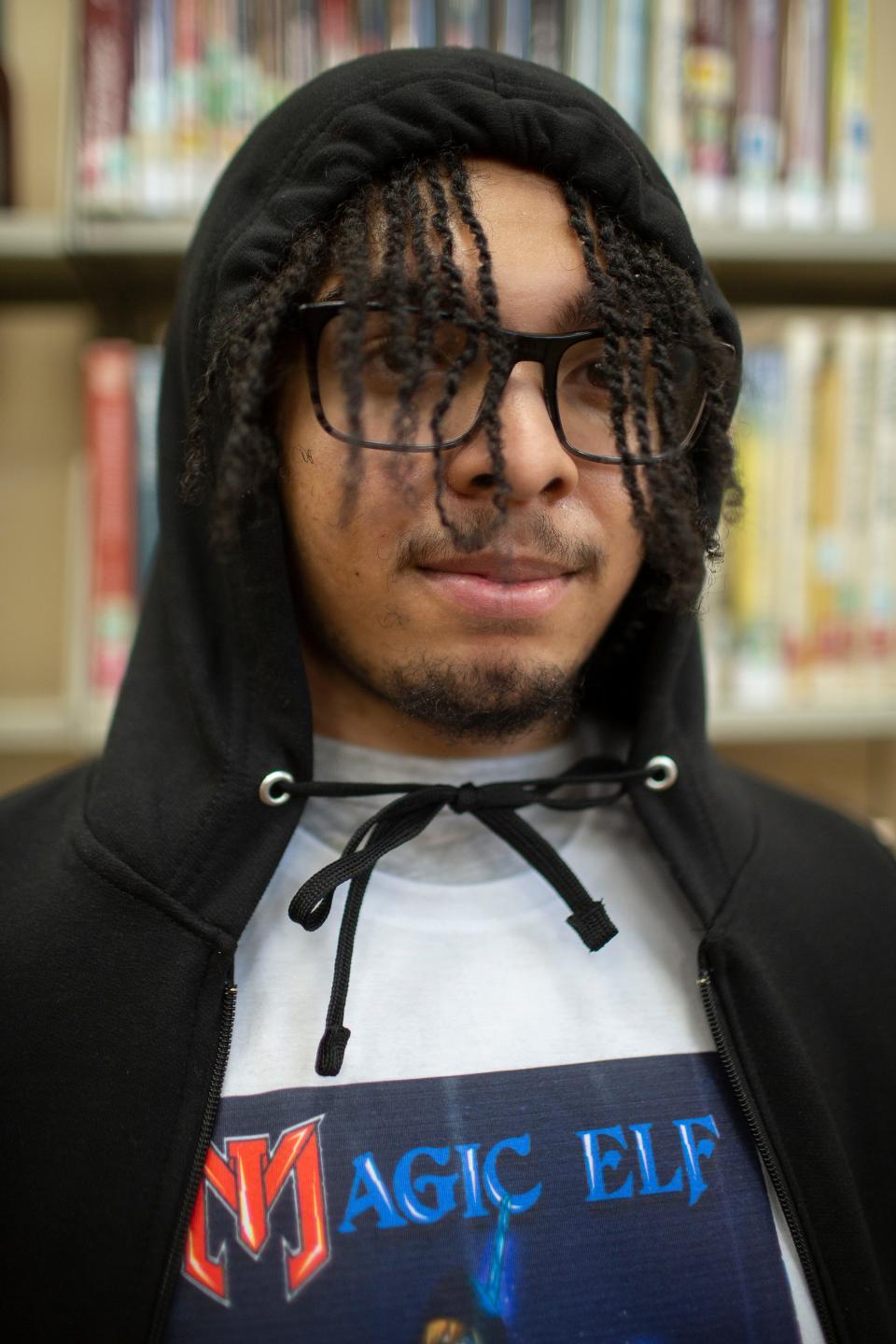 Ryon Conway poses for a portrait inside the Maury Couty Library in Columbia, Tenn., on Saturday, Feb. 19, 2022. 