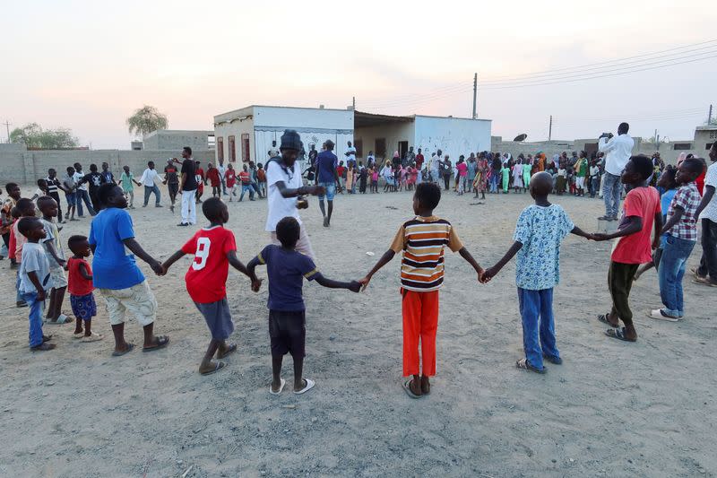 FILE PHOTO: General Kidi and Ganja Famer, members of the Nuba Mountain Sound band, train children to dance in Port Sudan