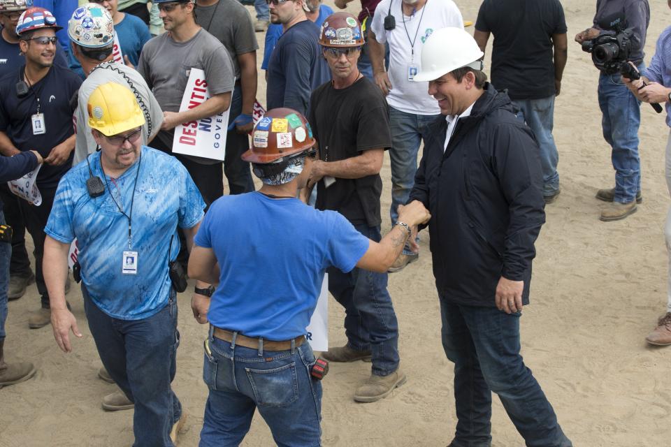 Ron DeSantis talks to workers at Eastern Shipbuilding about taxes, his background, public safety and taxes on Tuesday, September 25, 2018. DeSantis is struggling to attract support from blue collar voters as he campaigns for president.