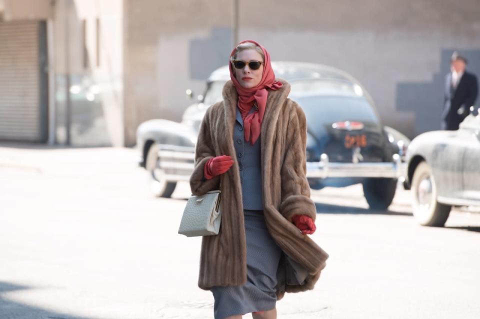 Cate Blanchett wears a fur coat in Carol. 