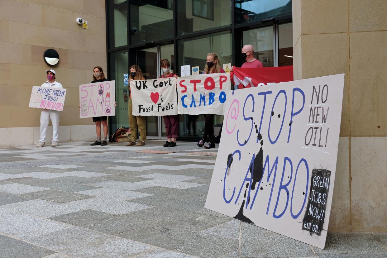 Climate change activists blocked the entrance to a new UK Government hub in Edinburgh to protest against the Cambo oil field’s approval (PA)