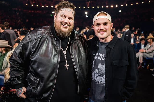 <p>John Shearer/Getty Images for CMA</p> Jelly Roll and Zach Bryan attend the CMA Awards at Bridgestone Arena on Nov. 8, 2023 in Nashville