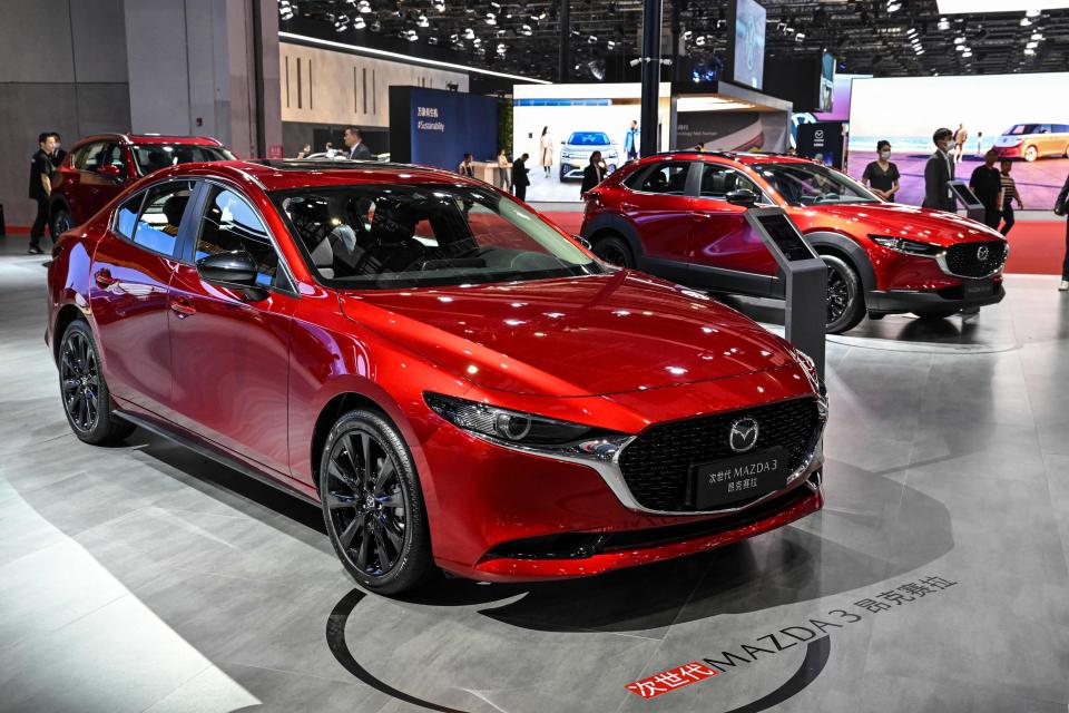 A Mazda 3 is displayed during the 20th Shanghai International Automobile Industry Exhibition in Shanghai, China, on April 19, 2023. / Credit: Hector Retamal/AFP via Getty Images