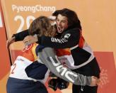 Freestyle Skiing - Pyeongchang 2018 Winter Olympics - Men's Ski Halfpipe Final - Phoenix Snow Park - Pyeongchang, South Korea - February 22, 2018 - David Wise of the U.S. and Nico Porteous of New Zealand celebrate. REUTERS/Jorge Silva