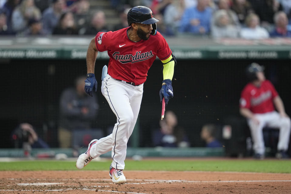 Cleveland Guardians' Amed Rosario runs toward first base after hitting a broken-bat single against the Boston Red Sox during the fourth inning of a baseball game Wednesday, June 7, 2023, in Cleveland. (AP Photo/Sue Ogrocki)