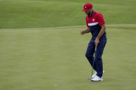 Team USA's Dustin Johnson reacts to his putt on the 17th hole during a Ryder Cup singles match at the Whistling Straits Golf Course Sunday, Sept. 26, 2021, in Sheboygan, Wis. (AP Photo/Ashley Landis)